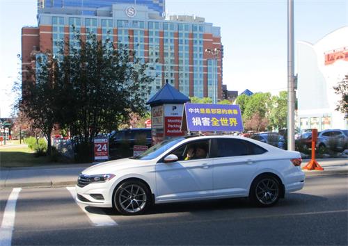 '圖5～7：退黨汽車經過唐人街路段。'